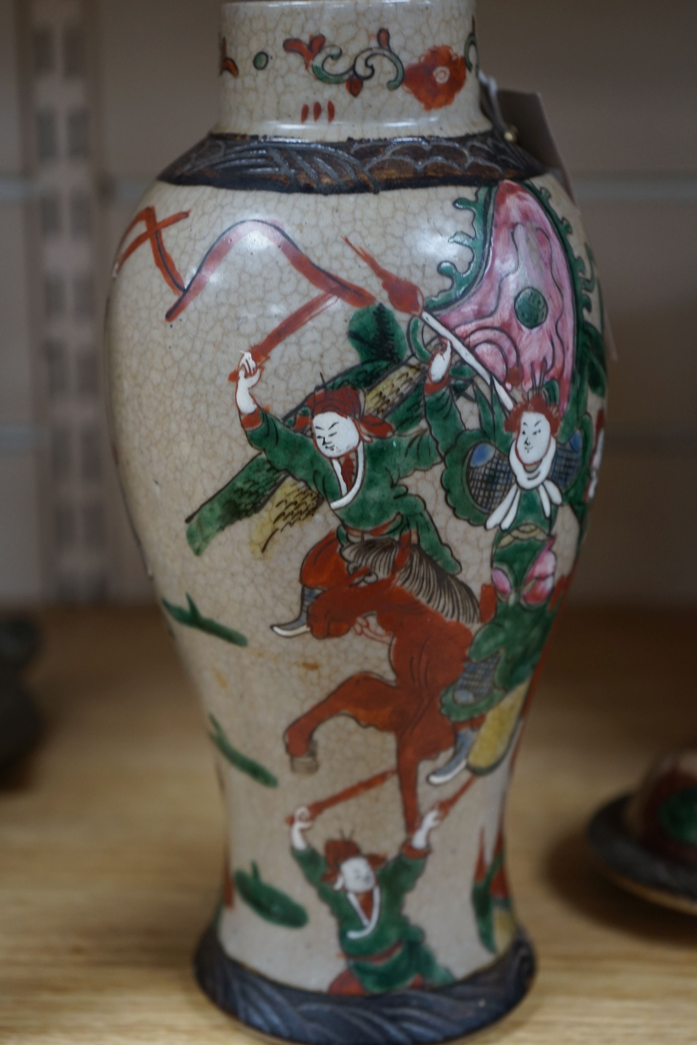 A late 19th century Chinese crackle glaze famille rose baluster vase and cover 30cm